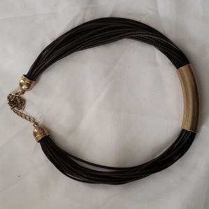 Leather and gold tone necklace